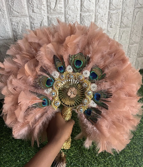 Blush feather hand fan with peacock details and jeweled trim