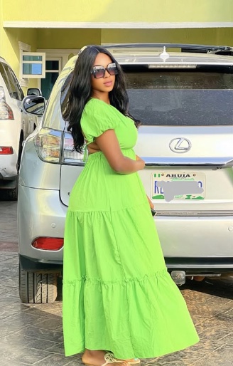 Fay Tee Craft maker in a bright green dress
